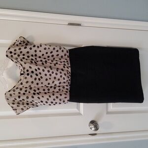 Black and taupe business casual dress.